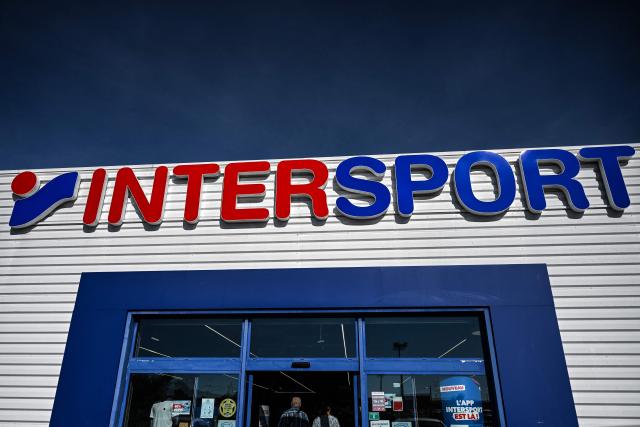 This photograph shows the logo of an Intersport retail shop in Beziers, Southern France on September 24, 2026. Intersport International Corporation ("IIC"), commonly known as Intersport, is a Swiss sporting goods brand retailer with its headquarters based in Bern, Switzerland. (Photo by Gabriel BOUYS / AFP)