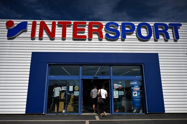 This photograph shows the logo of an Intersport retail shop in Beziers, Southern France on September 24, 2026. Intersport International Corporation ("IIC"), commonly known as Intersport, is a Swiss sporting goods brand retailer with its headquarters based in Bern, Switzerland. (Photo by Gabriel BOUYS / AFP)