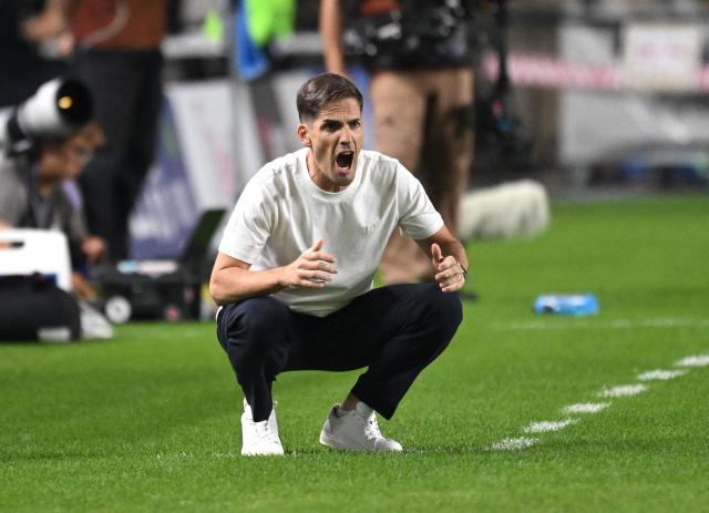 South Korea's interim head coach Robert Moreno reacts during the friendly football match between South Korea and Ecuador in Suwon on September 24, 2026. (Photo by Jung Yeon-je / AFP)