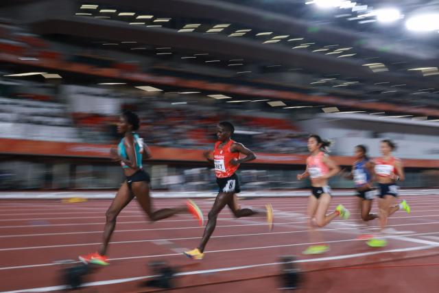 (L-3R) Kazakhstan's Daisy Jepkemei, Bahrain's Ruth Jebet and Japan's Nozomi Tanaka compete in the women's 10000m final during the 2026 Asian Games at Nagoya City Mizuho Park Athletic Stadium in Nagoya, Aichi Prefecture on September 24, 2026. (Photo by DAVID GRAY / AFP)