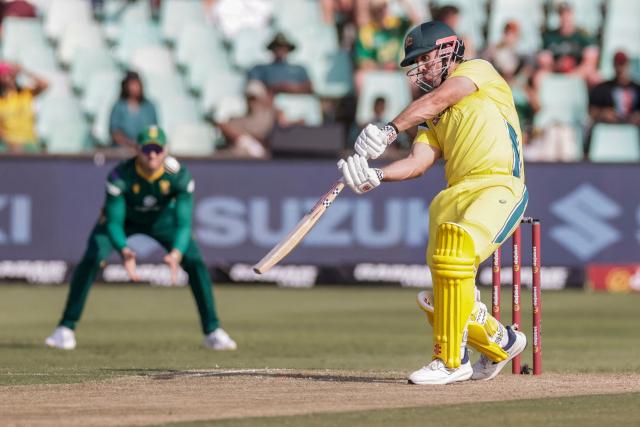 Australia's Mitchell Marsh hits a six during the first one-day international (ODI) cricket match between South Arica and Australia at the Kingsmead stadium in Durban on September 24, 2026. (Photo by GIANLUIGI GUERCIA / AFP)