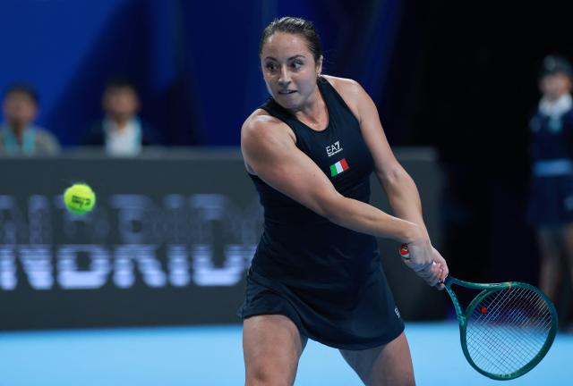 Italy's Elisabetta Cocciaretto hits a return to China's Zhang Shuai during their women's singles quarter-final match at the Billie Jean King Cup tennis tournament in Shenzhen, southern China's Guangdong province on September 24, 2026. (Photo by CN-STR / AFP) / China OUT