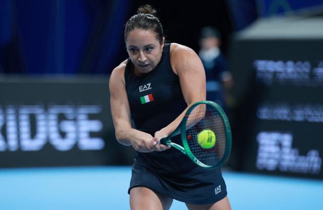 Italy's Elisabetta Cocciaretto hits a return to China's Zhang Shuai during their women's singles quarter-final match at the Billie Jean King Cup tennis tournament in Shenzhen, southern China's Guangdong province on September 24, 2026. (Photo by CN-STR / AFP) / China OUT