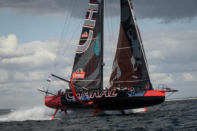 French skipper Jeremie Beyou sails his Imoca monohull Charal during the run event of the Defi Azimut ahead of the Route du Rhum solo sailing race, in the Atlantic Ocean off Lorient, western France, on September 16, 2026. The Transatlantic Route du Rhum solo sailing race from Saint-Malo in western France to Pointe-a-Pitre in the French overseas island of Guadeloupe is scheduled to depart on November 1, 2026. (Photo by Loic VENANCE / AFP)