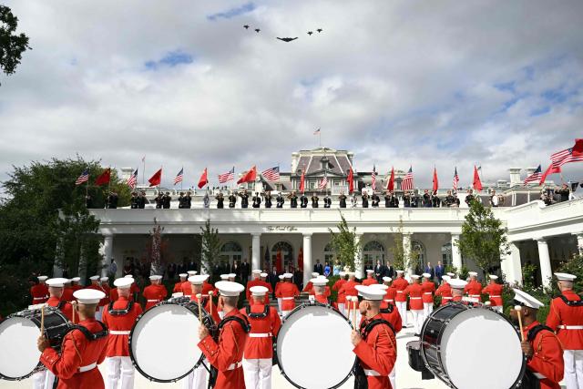 TOPSHOT - US military plane fly over the Rose Garden during a military review for China's President Xi Jinping at the White House in Washington, DC, on September 24, 2026. President Xi is on a State visit to the United States from September 23 to 25. (Photo by SAUL LOEB / AFP)