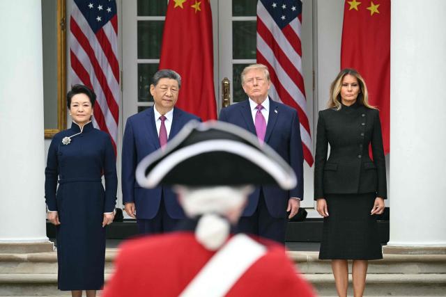 (L/R) China's First Lady Peng Liyuan, China's President Xi Jinping, US President Donald Trump and US First Lady Melania Trump look on during a military review in the Rose Garden of the White House in Washington, DC, on September 24, 2026. President Xi is on a State visit to the United States from September 23 to 25. (Photo by SAUL LOEB / AFP)