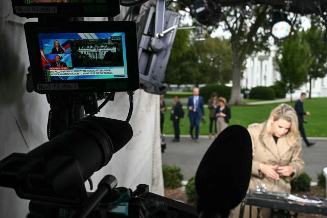 CNN White House reporter Betsy Klein works in the CNN workspace outside the West Wing of the White House in Washington, DC, on September 24, 2026. CNN and MS NOW said their reporters were allowed back into the White House on Thursday after a judge ordered that their access be restored. It was not immediately clear if journalists for Politico -- the third media outlet banned last week by President Donald Trump -- had also been allowed to return to the White House. (Photo by SAUL LOEB / AFP)