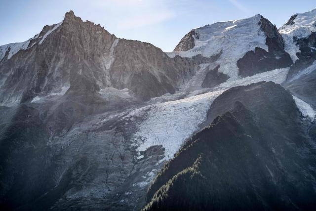 This photograph shows a view of a hole on the Bossons glacier in the Mont-Blanc massif of the Alps in the Chamonix valley, central-eastern France on September 23, 2026. (Photo by JEFF PACHOUD / AFP)