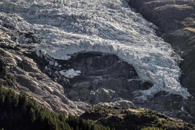 This photograph shows a view of a hole on the Bossons glacier in the Mont-Blanc massif of the Alps in the Chamonix valley, central-eastern France on September 23, 2026. (Photo by JEFF PACHOUD / AFP)