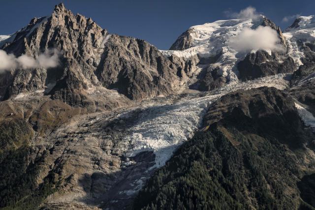 This photograph shows a view of a hole on the Bossons glacier in the Mont-Blanc massif of the Alps in the Chamonix valley, central-eastern France on September 23, 2026. (Photo by JEFF PACHOUD / AFP)