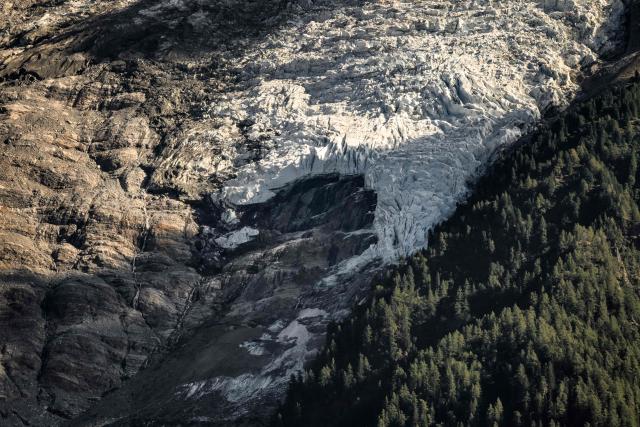 This photograph shows a view of a hole on the Bossons glacier in the Mont-Blanc massif of the Alps in the Chamonix valley, central-eastern France on September 23, 2026. (Photo by JEFF PACHOUD / AFP)
