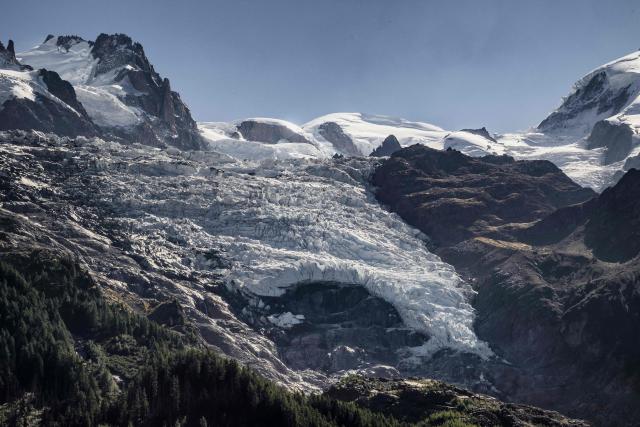 This photograph shows a view of a hole on the Bossons glacier in the Mont-Blanc massif of the Alps in the Chamonix valley, central-eastern France on September 23, 2026. (Photo by JEFF PACHOUD / AFP)
