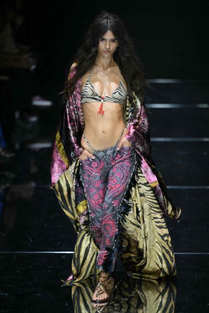 A model walks the runway during the Roberto Cavalli collection show as part of Women's Spring/Summer 2027 Milan's fashion week, on September 24, 2026. (Photo by Marco BERTORELLO / AFP)