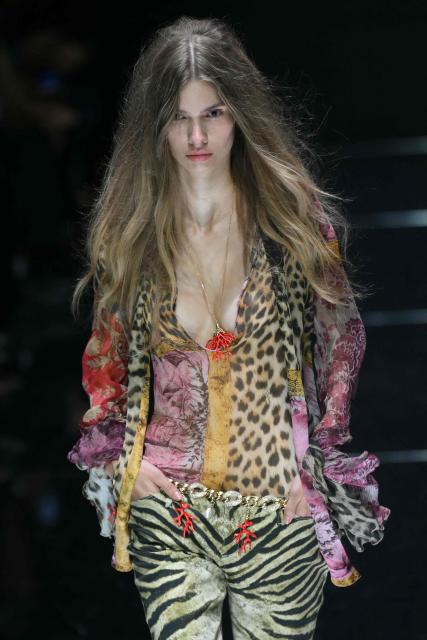 A model walks the runway during the Roberto Cavalli collection show as part of Women's Spring/Summer 2027 Milan's fashion week, on September 24, 2026. (Photo by Marco BERTORELLO / AFP)