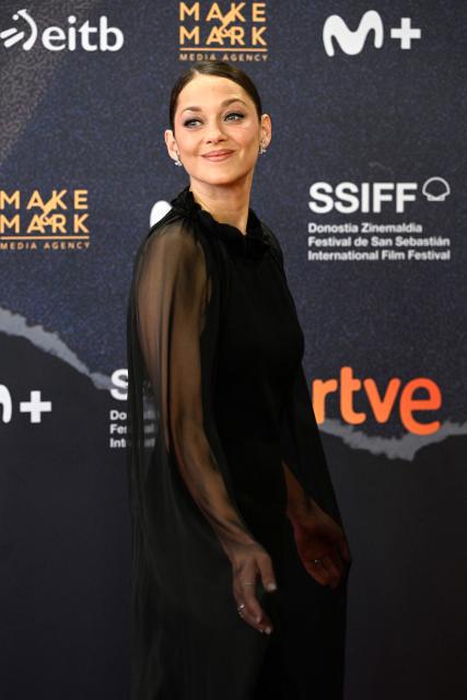 French actress Marion Cotillard poses on the red carpet to promote the film "Milo" (or "7h40 ce matin-la) during the 74th San Sebastian International Film Festival in the northern Spanish Basque city of San Sebastian on September 24, 2026. (Photo by ANDER GILLENEA / AFP)