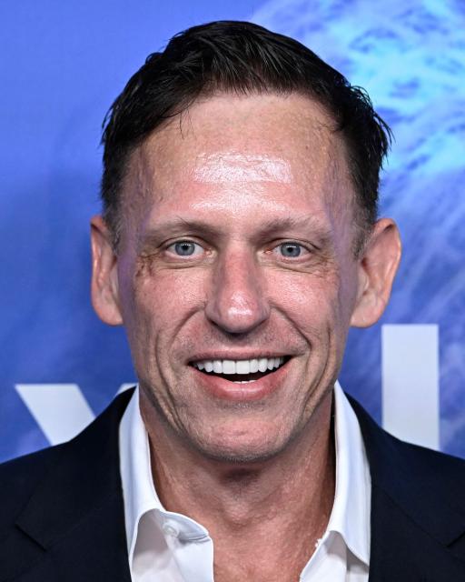 German-US entrepreneur, venture capitalist and conservative political activist Peter Thiel arrives on the red carpet for the Axel Springer Award in Berlin on September 24, 2026. (Photo by Tobias SCHWARZ / AFP)