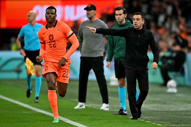 Netherlands' coach Xavi Hernandez (R) gestures during the UEFA Nations League (League A, Group A2) football match between Netherlands and Germany at Johan Cruijff ArenA in Amsterdam on September 24, 2026. (Photo by NICOLAS TUCAT / AFP)