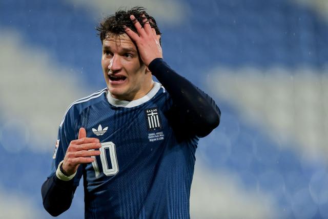 Greece's forward #10 Christos Tzolis reacts after scoring his team's first goal during the UEFA Nations League phase group A2 football match between Serbia and Greece at the Rajko Mitic Stadium in Belgrade on September 24, 2026. (Photo by Pedja Milosavljevic / AFP)