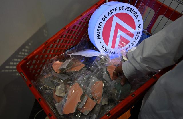 An installation titled "Pedazo de museo", composed of fragments from the Pereira Art Museum building damaged in a recent earthquake, is displayed during the ARTBO International Art Fair in Bogota on September 24, 2026. (Photo by Raul ARBOLEDA / AFP)