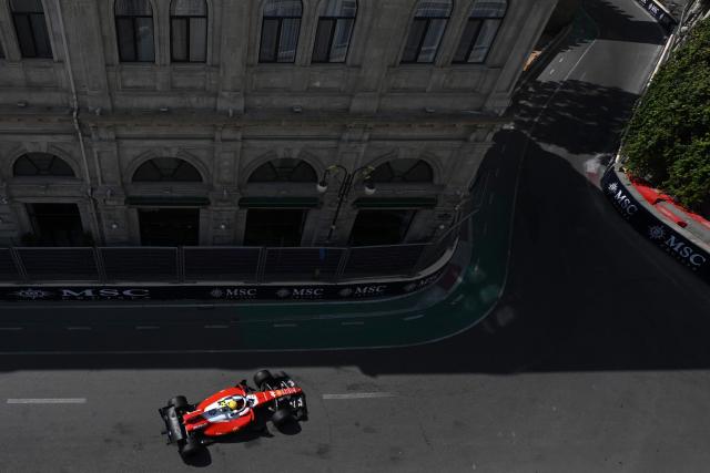 Ferrari's British driver Lewis Hamilton steers his car during the third practice session ahead of the Formula One Azerbaijan Grand Prix at the Baku City Circuit in Baku on September 25, 2026. (Photo by Igor IVANKO / AFP)