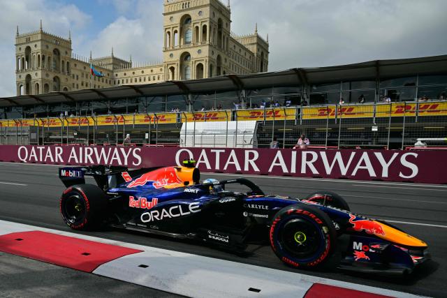 Red Bull Racing's French driver Isack Hadjar steers his car during the third practice session ahead of the Formula One Azerbaijan Grand Prix at the Baku City Circuit in Baku on September 25, 2026. (Photo by Andrej ISAKOVIC / AFP)