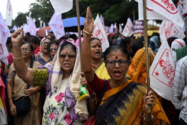 Demonstrators shout slogans against India's Chief Election Commissioner Gyanesh Kumar, demanding his resignation during a protest rally in Kolkata on September 25, 2026. The Election Commission of India (ECI) has been under scrutiny in recent months over the nationwide revision that has struck millions of names from voter lists since last year. (Photo by Dibyangshu SARKAR / AFP)