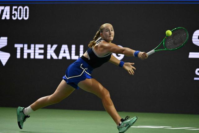 Russia's Mirra Andreeva hits a return against Canada's Leyla Fernandez during the WTA Singapore Open Tennis quarterfinal in Singapore on September 25, 2026. (Photo by Roslan RAHMAN / AFP)