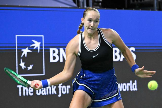 Russia's Mirra Andreeva hits a return against Canada's Leyla Fernandez during the WTA Singapore Open Tennis quarterfinal in Singapore on September 25, 2026. (Photo by Roslan RAHMAN / AFP)