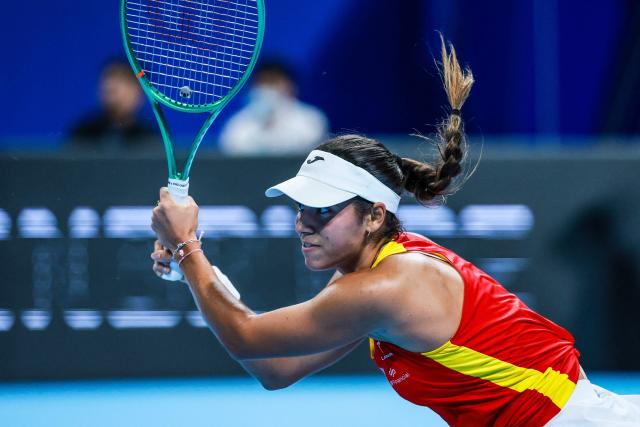 Spain’s Jessica Bouzas Maneiro hits a return to Czech Republic’s Karolina Muchova during their women’s singles semi-final match at the Billie Jean King Cup tennis tournament in Shenzhen, in China’s southern Guangdong province on September 25, 2026. (Photo by CN-STR / AFP) / China OUT