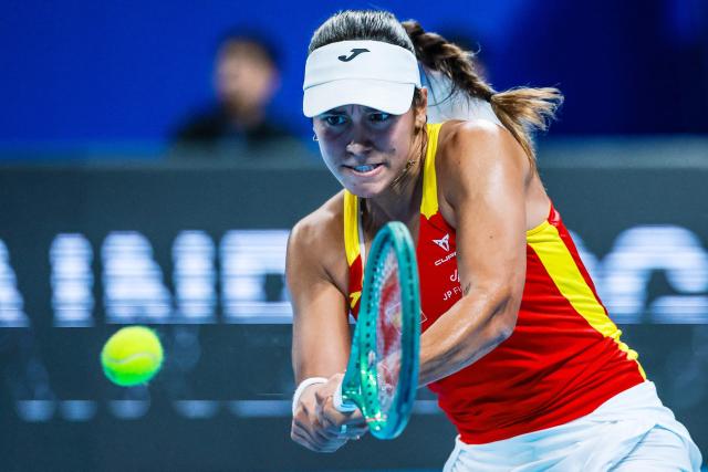 Spain’s Jessica Bouzas Maneiro hits a return to Czech Republic’s Karolina Muchova during their women’s singles semi-final match at the Billie Jean King Cup tennis tournament in Shenzhen, in China’s southern Guangdong province on September 25, 2026. (Photo by CN-STR / AFP) / China OUT