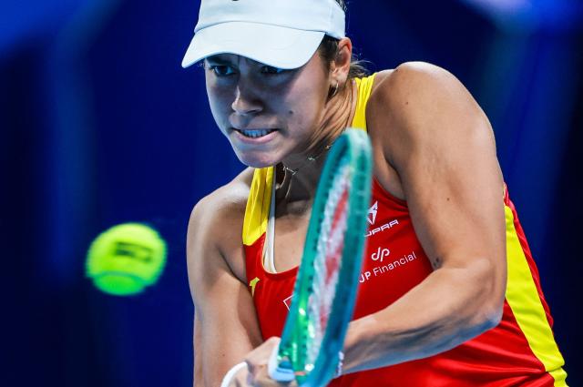 Spain’s Jessica Bouzas Maneiro hits a return to Czech Republic’s Karolina Muchova during their women’s singles semi-final match at the Billie Jean King Cup tennis tournament in Shenzhen, in China’s southern Guangdong province on September 25, 2026. (Photo by CN-STR / AFP) / China OUT