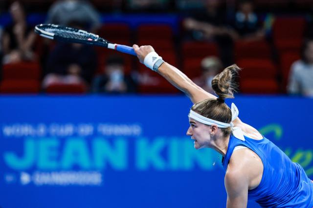 Czech Republic’s Karolina Muchova serves to Spain’s Jessica Bouzas Maneiro during their women’s singles semi-final match at the Billie Jean King Cup tennis tournament in Shenzhen, in China’s southern Guangdong province on September 25, 2026. (Photo by CN-STR / AFP) / China OUT