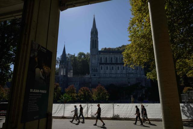A general view shows the Basilica of our Lady of the Rosary in Lourdes, south-western France, a day ahead of the Pope's visit, on September 25, 2026. On the first official papal trip in 18 years to a proudly secular country that has since 1901 separated church and state, Pope Leo will visit Lourdes, a pilgrimage site for Christians worldwide where he will privately meet victims of clerical sex abuse, and Metz, near the German border, where he is to further speak about peace in Europe. (Photo by Ed JONES / AFP)
