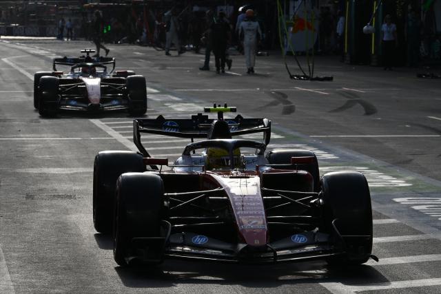 Ferrari's British driver Lewis Hamilton steers his car during the qualifying session of the Formula One Azerbaijan Grand Prix at the Baku City Circuit in Baku on September 25, 2026. (Photo by Igor IVANKO / POOL / AFP)