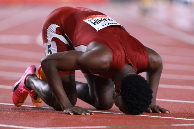 Qatar's Ammar Ibrahim reacts after finishing second in the men's 400m heat during the 2026 Asian Games at Nagoya City Mizuho Park Athletic Stadium in Nagoya, Aichi Prefecture on September 25, 2026. (Photo by DAVID GRAY / AFP)