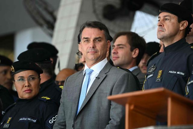 Brazil's senator and presidential candidate for the Liberal Party (PL) Flavio Bolsonaro attends a graduation ceremony of new military police officers at the Center of Improvement and Training of Soldiers (CFAP) at Sulacap neighbourhood in Rio de Janeiro, Brazil, on September 25, 2026. Brazil will hold presidential election on October 4, 2026. (Photo by MAURO PIMENTEL / AFP)