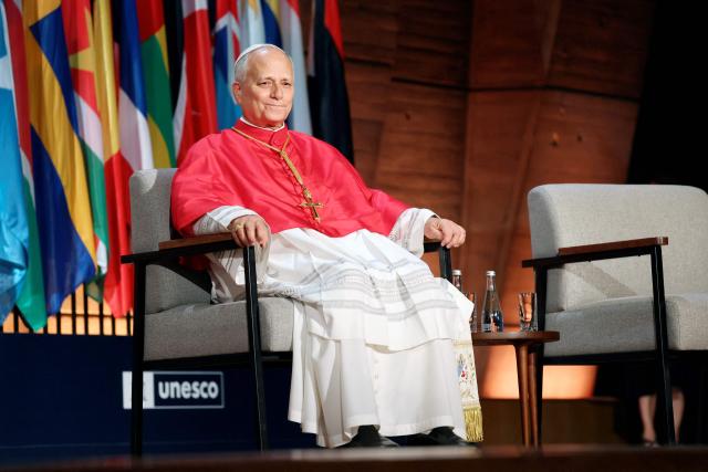 Pope Leo XIV sits on stage prior to deliver a speech during a visit at the UNESCO headquarters, in Paris on September 25, 2026 as part of his four days trip to France. (Photo by Thomas SAMSON / AFP)