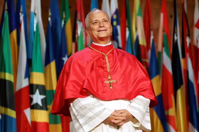 Pope Leo XIV reacts as he arrives on stage prior to deliver a speech during a visit at the UNESCO headquarters, in Paris on September 25, 2026 as part of his four days trip to France. (Photo by Thomas SAMSON / AFP)