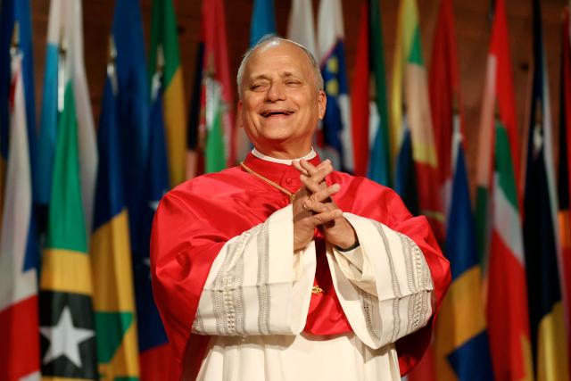Pope Leo XIV reacts on stage prior to deliver a speech during a visit at the UNESCO headquarters, in Paris on September 25, 2026 as part of his four days trip to France. (Photo by Thomas SAMSON / AFP)