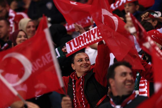 A Turkey's supporter cheers her team ahead of the UEFA Nations League (League A, Group 1) first leg football match between Turkey and France at the Kocaeli Stadium in Izmit, on September 25, 2026. (Photo by FRANCK FIFE / AFP)