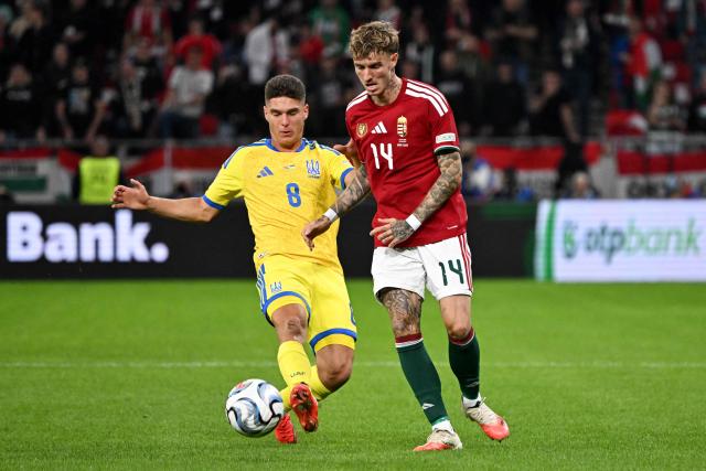 Ukraine's midfielder Georgiy Sudakov (L) and Hungary's midfielder #14 Bendeguz Bolla vie for the ball during the UEFA Nations League Group B2 football match between Hungary and Ukraine in Budapest, Hungary on September 25, 2026. (Photo by Attila KISBENEDEK / AFP)