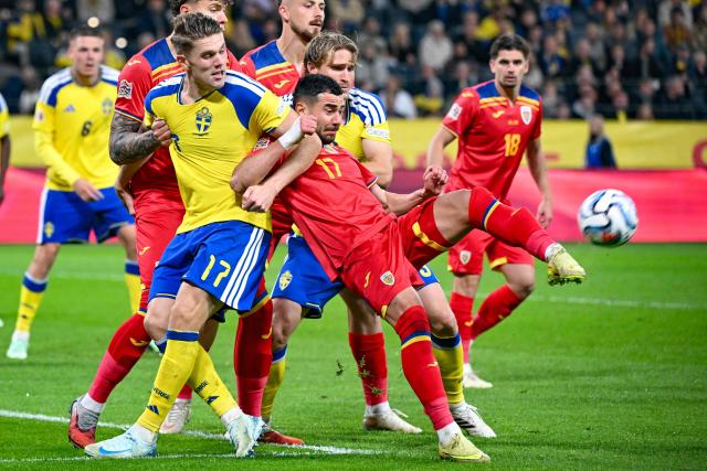 Sweden's forward #17 Viktor Gyokeres (L) and Romania's defender #17 Vladimir Screciu vie for the ball during the UEFA Nations League Group B4 football match between Sweden and Romania in Solna, Sweden on September 25, 2026. (Photo by Jonathan Nackstrand / AFP)