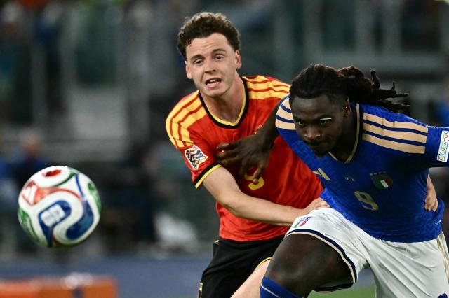 Italy's forward #09 Moise Kean fights for the ball with Belgium's defender #05 Maxim De Cuyper during the UEFA Nations League (League A, Group 1) football match between Italy and Belgium at the Olympic Stadium in Rome on September 25, 2026. (Photo by Filippo MONTEFORTE / AFP)