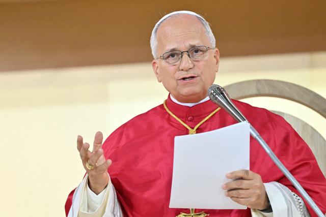 Pope Leo XIV delivers his homely during a prayer vigil with young people at the Stade de France stadium, in Saint-Denis on the outskirts of Paris on September 25, 2026 as part of his four days visit to France. (Photo by LOU BENOIST / AFP)