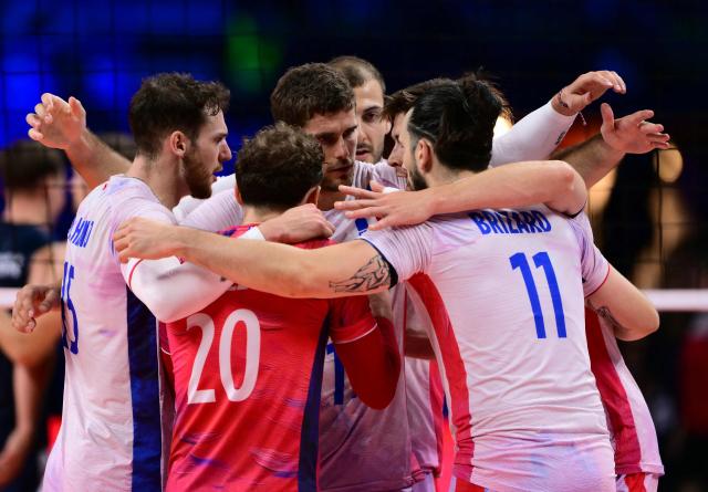 France players celebrate after a set point during the CEV EuroVolley 2026 men's semifinal volleyball match between Finland and France at the Forum of Assago, on September 25, 2026. (Photo by Marco BERTORELLO / AFP)