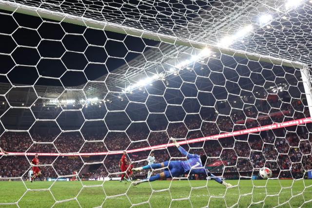 Turkey's goalkeeper #01 Ugurcan Cakir concedes France's first goal during the UEFA Nations League (League A, Group 1) first leg football match between Turkey and France at the Kocaeli Stadium in Izmit, on September 25, 2026. (Photo by FRANCK FIFE / AFP)