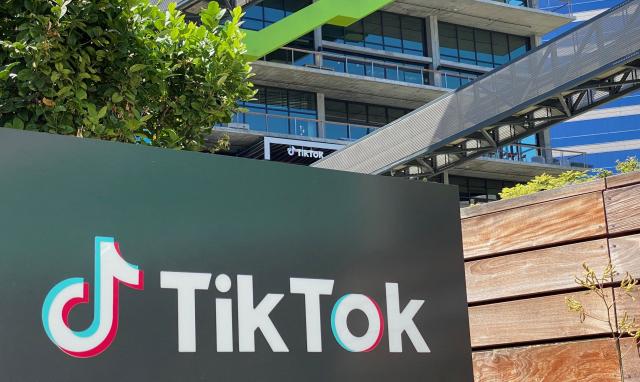 (FILES) The logo of Chinese video app TikTok is seen on the side of the company's new office space at the C3 campus on August 11, 2020 in Culver City, in the westside of Los Angeles. TikTok on September 25 agreed to a settlement with Alabama just days before a trial was set to begin over claims the company misled parents about tools meant to shield children from harmful content. "Under the settlement, Alabama will receive a minimum of $100 million, due to the state within 45 days, with the potential to receive up to $300 million if certain conditions are met," the office of the attorney general in the southern US state said in a statement. (Photo by Chris DELMAS / AFP)