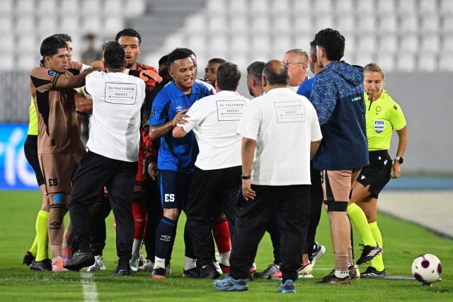 El Salvador's players and Martinique's players argue during the Concacaf Nations League Cup football match between El Salvador and Martinique, at the Jorge 'El Magico' Gonzalez stadium in San Salvador, on September 25, 2026. (Photo by MARVIN RECINOS / AFP)
