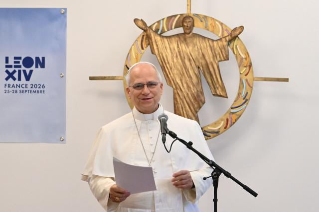Pope Leo XIV speaks during a visit to the Maison Bakhita, a support and social integration centre, in Paris on September 26, 2026 on the second day of his visit to France. (Photo by Alberto PIZZOLI / POOL / AFP)