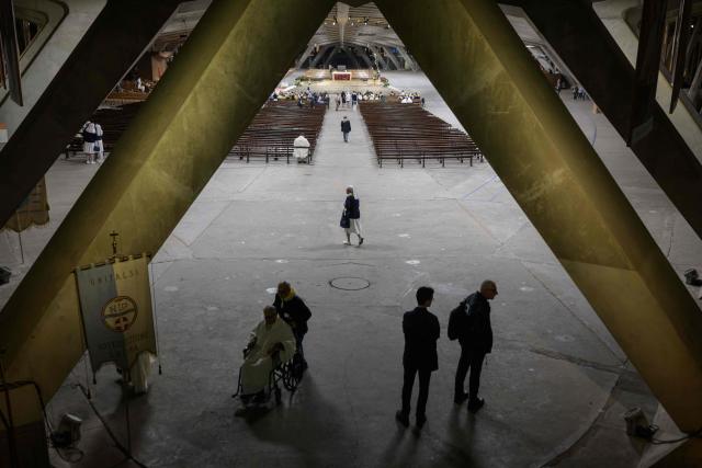 Worshippers and prelates gather for a mass at the basilique Saint Pie, in Lourdes on September 26, 2026. (Photo by Ed JONES / AFP)